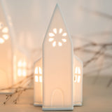 Petite église lumineuse Klein en porcelaine blanche Räder vue de face avec ouverture pour bougie
