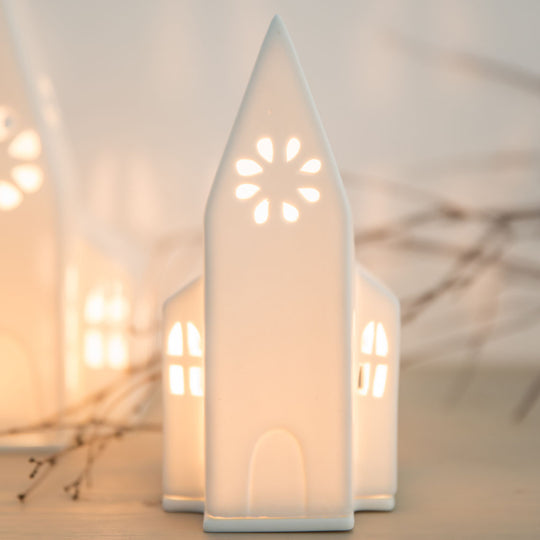 Petite église lumineuse Klein en porcelaine blanche Räder vue de face avec ouverture pour bougie