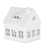 Bougeoir architectural Räder style maison avec perforations ajourées diffusant une lumière tamisée et douce