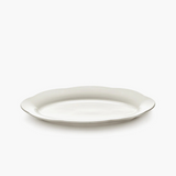 Porcelaine émaillée assiette ovale fluide design gastronomique art de table