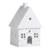 Maison en pain d'épices lumineuse en porcelaine blanche Räder avec ouvertures délicates pour bougie