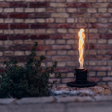 Vue détaillée de la cartouche du brûleur à bioéthanol liquide du Höfats SPIN 1200, conçue pour un remplissage sécurisé et une combustion propre sans suie.