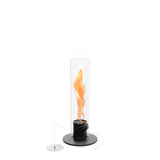 Cheminée de table compacte au bioéthanol Höfats SPIN 900 noir mat. Structure comprenant un cylindre protecteur en verre borosilicaté et un socle en acier inoxydable revêtu par poudre.