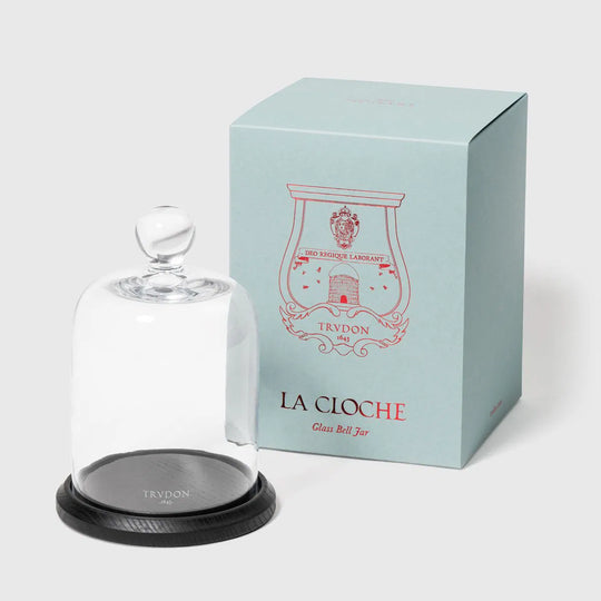 Cloche en verre soufflé Trudon avec socle en bois poli pour bougie parfumée, design épuré et haut de gamme