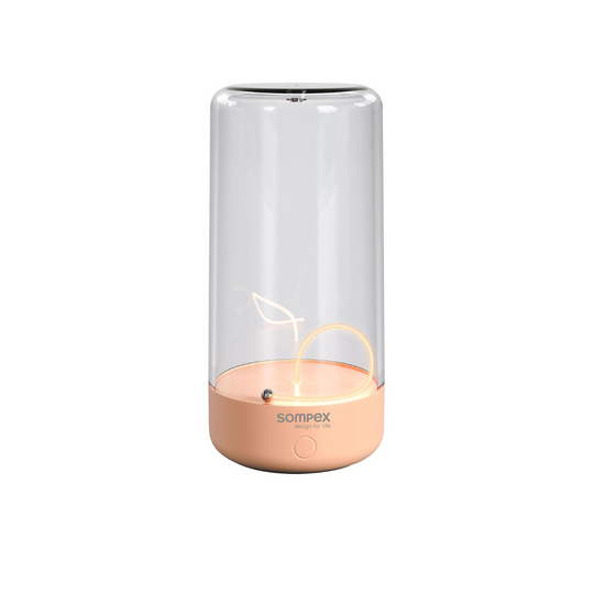 Lampe de table Pulse Sompex couleur abricot avec filament LED flottant magnétique et design épuré